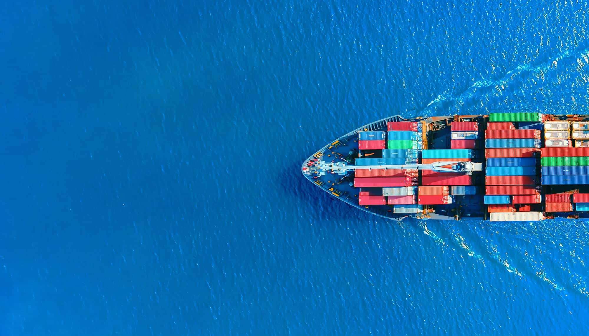 Container terminal gantry cranes working a berthed container vessel